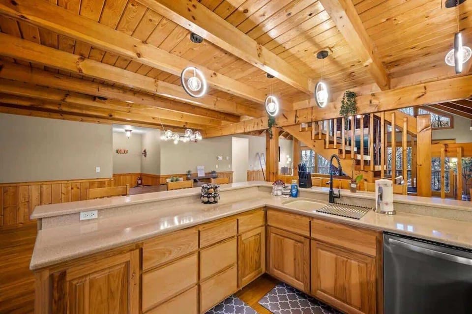 Whip up delicious meals in this airy space with stunning wooden beams!