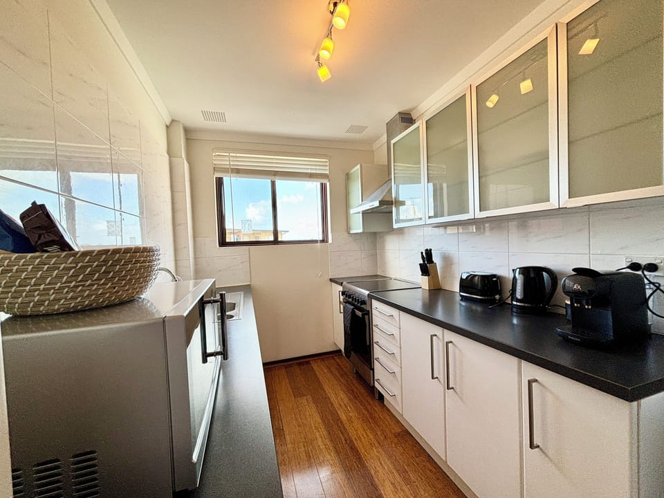 Full fridge, microwave, stove top and oven, dishwasher, coffee maker and much more