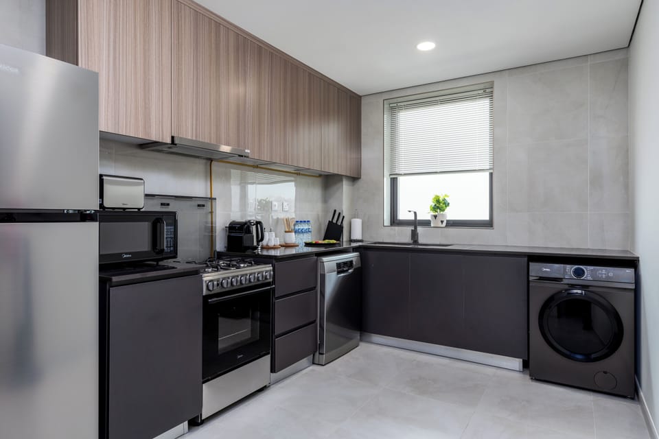 Comfort Apartment, Balcony | Private kitchen | Fridge, microwave, oven, stovetop