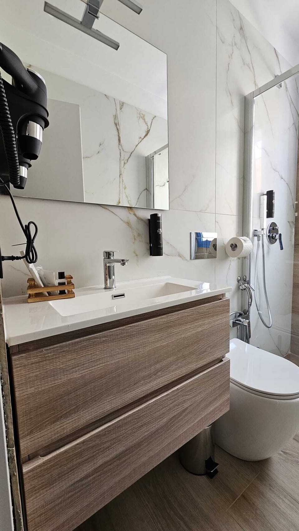 Shower, free toiletries, hair dryer, slippers