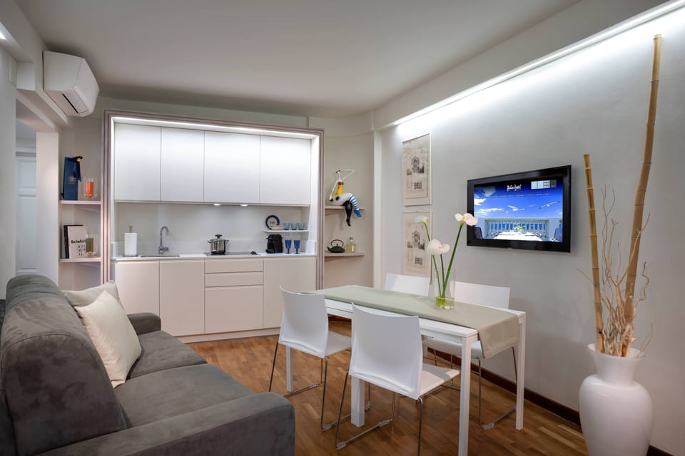 Superior Apartment, Balcony | Living area | 32-inch flat-screen TV with cable channels