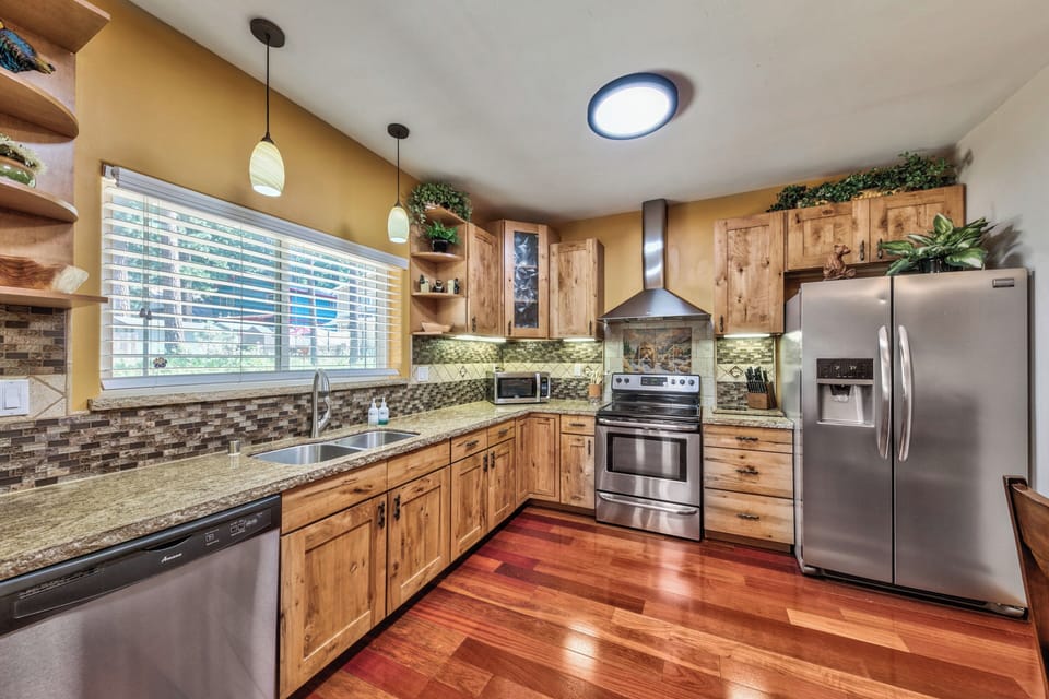 Beautiful kitchen with stainless steel appliances and lots of counterspace