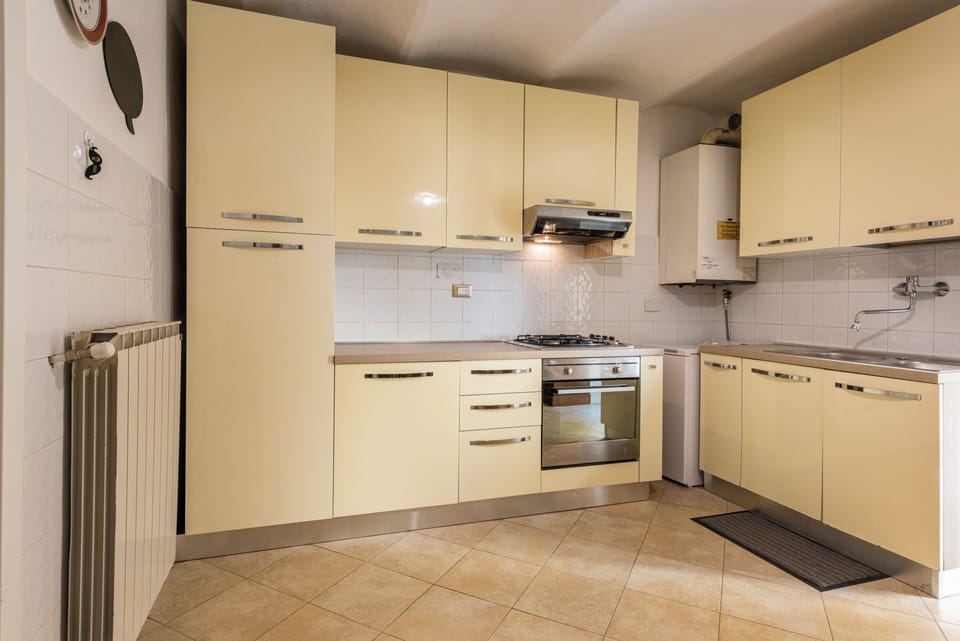 Fridge, stovetop, cookware/dishes/utensils