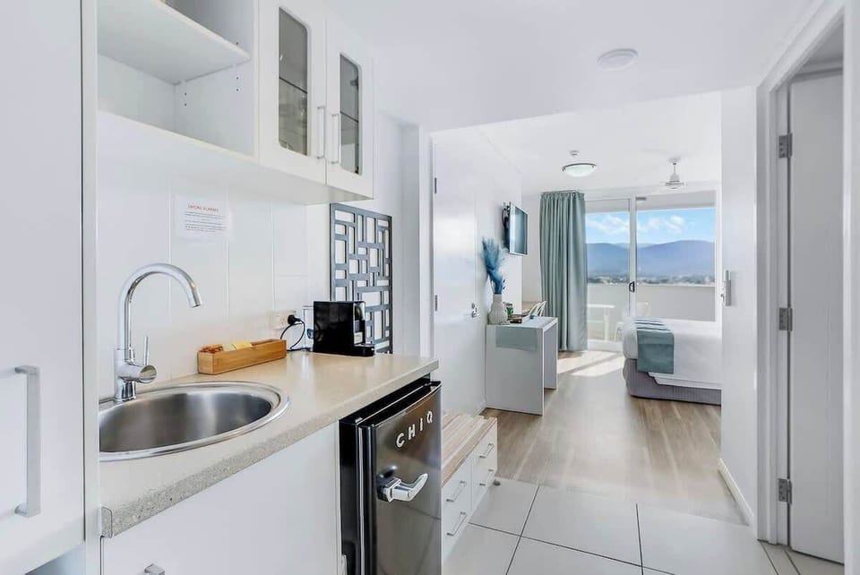A kitchenette offers a Nespresso machine, mini fridge, microwave and a toaster.
