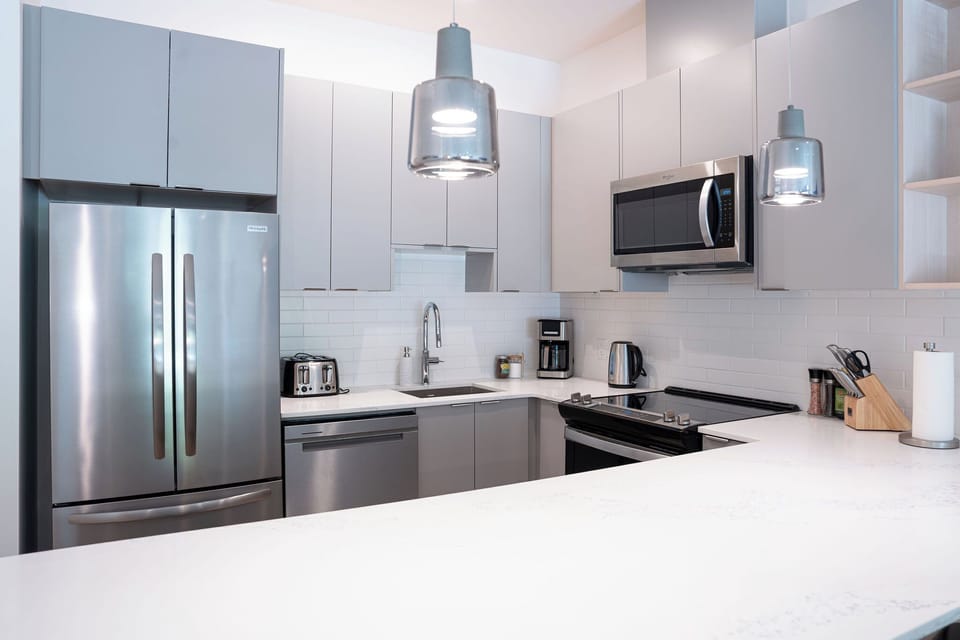 Condo | Private kitchen | Coffee/tea maker, fridge, microwave, oven