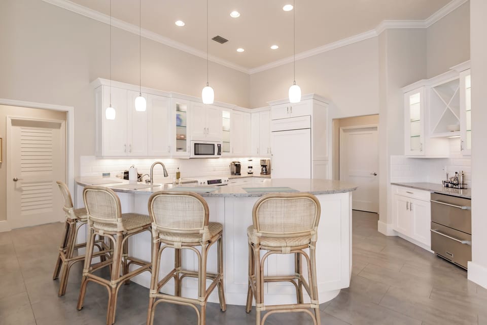 Gourmet Kitchen: Whip up your favorite dishes in this bright, modern space with stylish seating!