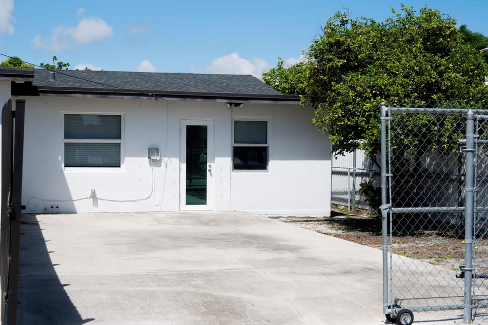 Enjoy the privacy of a fully fenced property with parking for up to two cars.