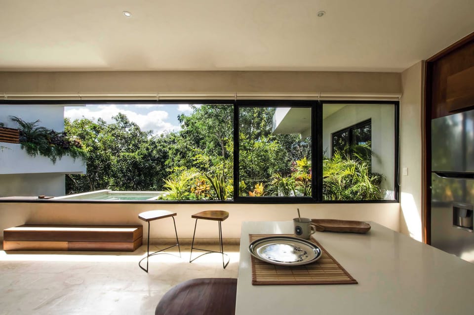 On the second floor, discover beautifully designed minimalist living areas complemented by a stylish kitchenette and a private plunge pool—perfect for relaxing in privacy