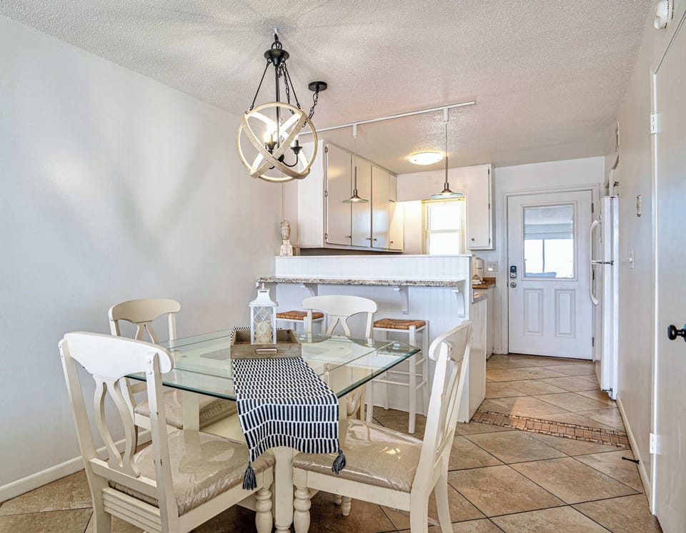 Dining area with table and seating for 4