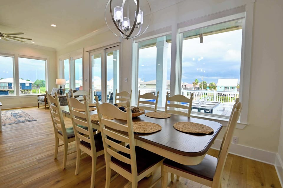 Gather for meals at the dining table, with seating for 8