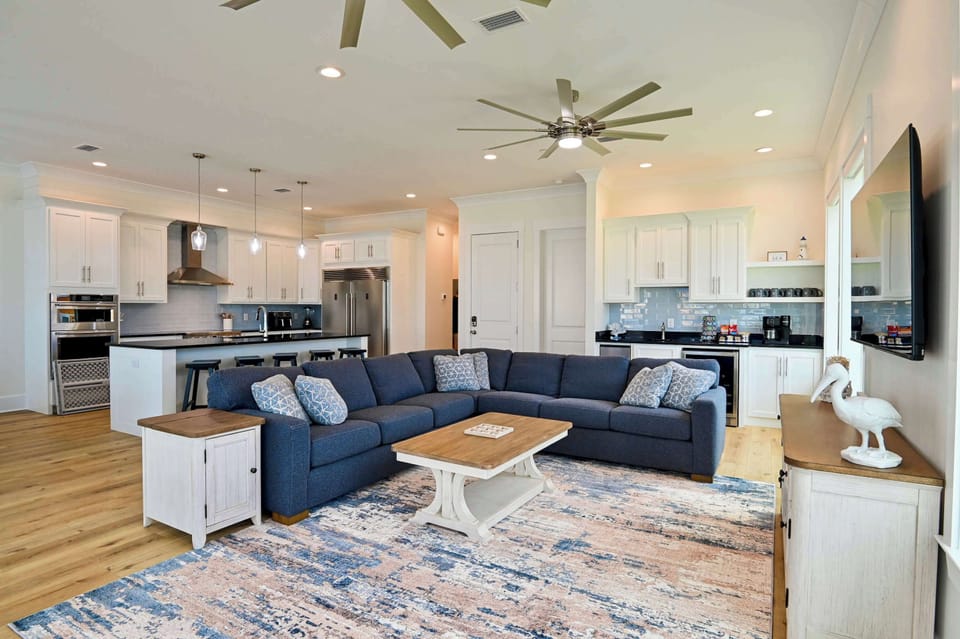 Curl up in the chic living room & stream your favorites on the smart TV