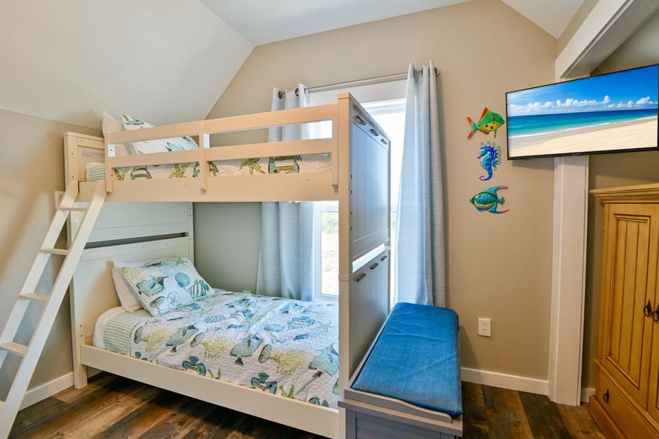 The 3rd floor bedroom offers twin-over-full bunks, and twin-over-twin bunks with a smart tv