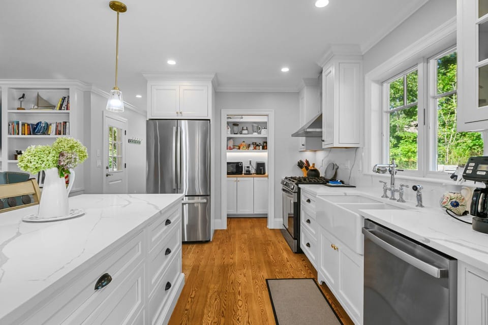 Kitchen with breakfast bar and pantry