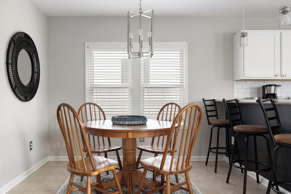 Flexible dining options w/ dining table and kitchen bar seating