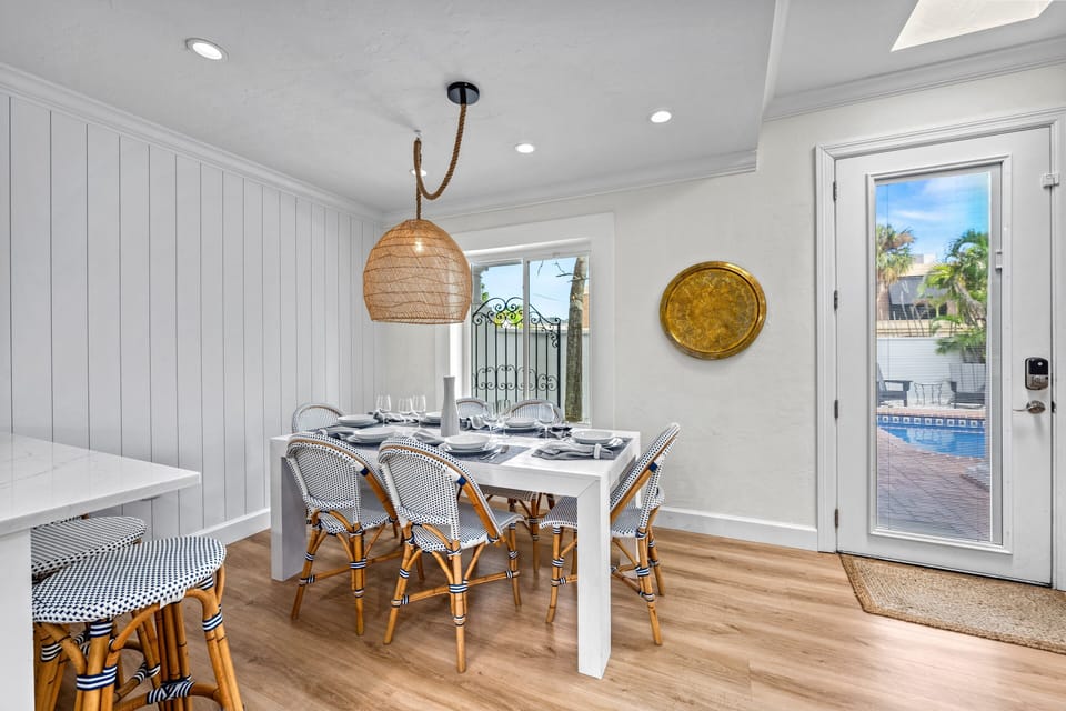 Step through the front door and be greeted by a bright, open dining space—where natural light meets clean lines and every seat invites connection.