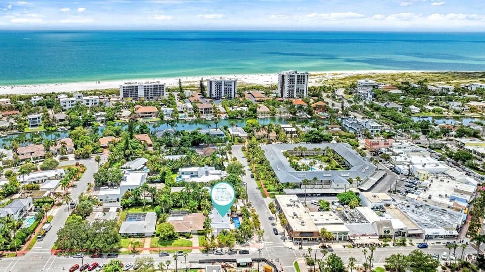 Just five minutes from the sand, this aerial shows how close you are to the Gulf's edge—and even closer to St. Armands Circle's vibrant energy.