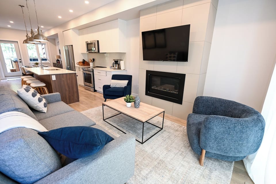 Living room with fireplace and Smart TV
