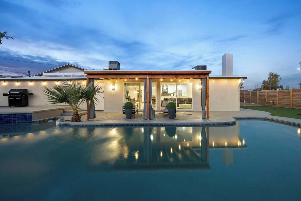 Unwind by the spacious pool or relax under the shaded loungers.