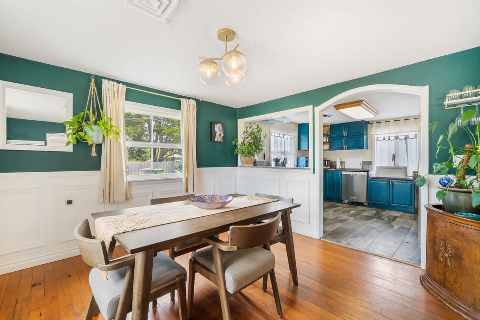 Enjoy a seamless flow between spaces. The bohemian-inspired dining area opens right up into our recently remodeled kitchen, making it easy to chat with the chef or grab a seat at the 1958 breakfast bar.