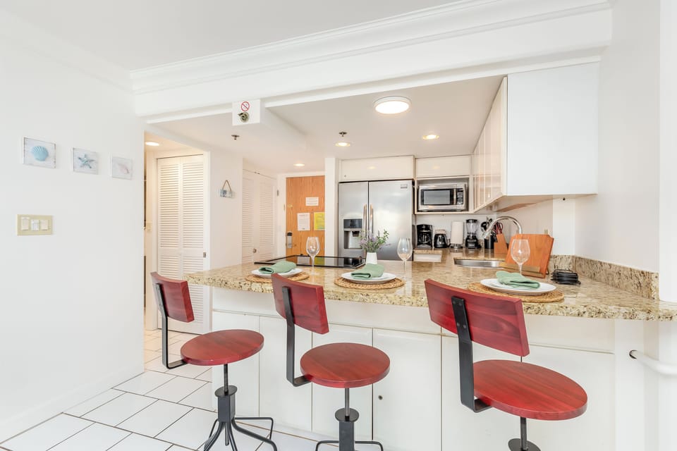 Gather around our kitchen island for unforgettable moments