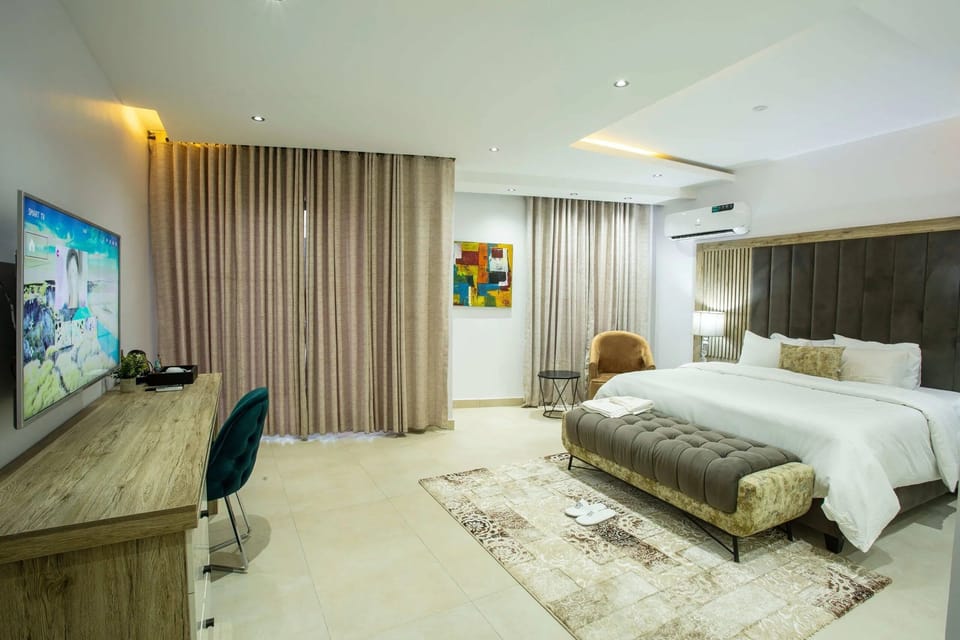 Deluxe Room, Balcony, City View | Desk, laptop workspace, free WiFi