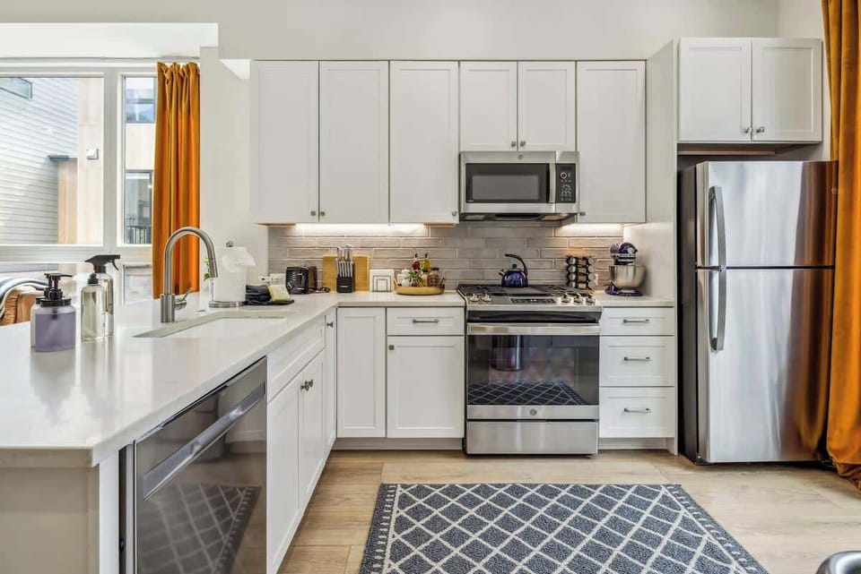 Kitchen with all stainless steel appliances