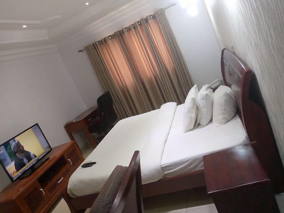 Deluxe Room, Balcony, City View | Desk, laptop workspace, free WiFi
