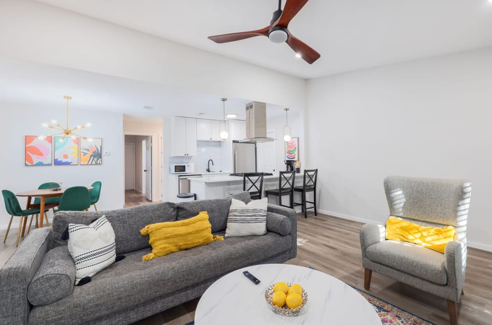 Open, modern design with plenty of natural light – gather, stream, or unwind in style