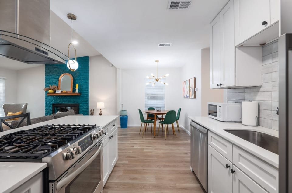 Enjoy our open-concept space with a cozy feel and a gas stove for incredible meals. Cook while your family relaxes at the bar seats, creating the perfect blend of connection and comfort.