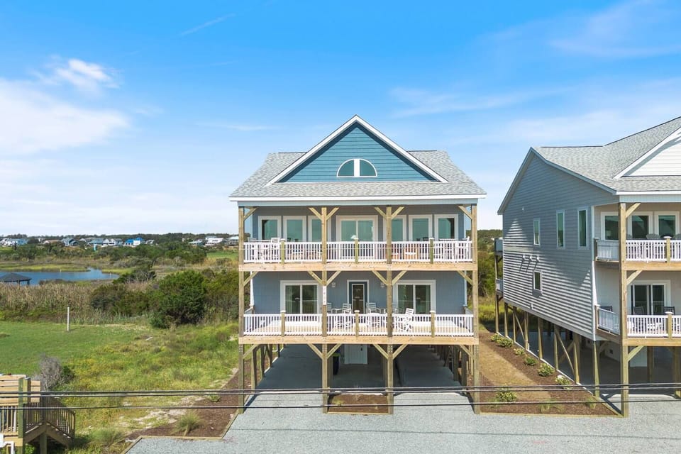 Welcome to your spacious 8BR coastal retreat—easy parking and elevator access.