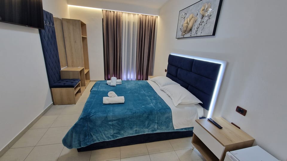 Double Room, City View | Desk, soundproofing, iron/ironing board, bed sheets