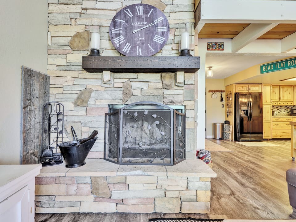View of stone fire place with guards