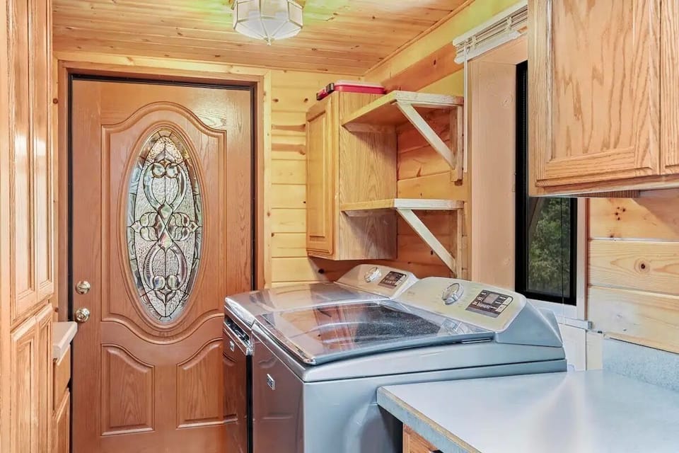 Laundry area next to kitchen.