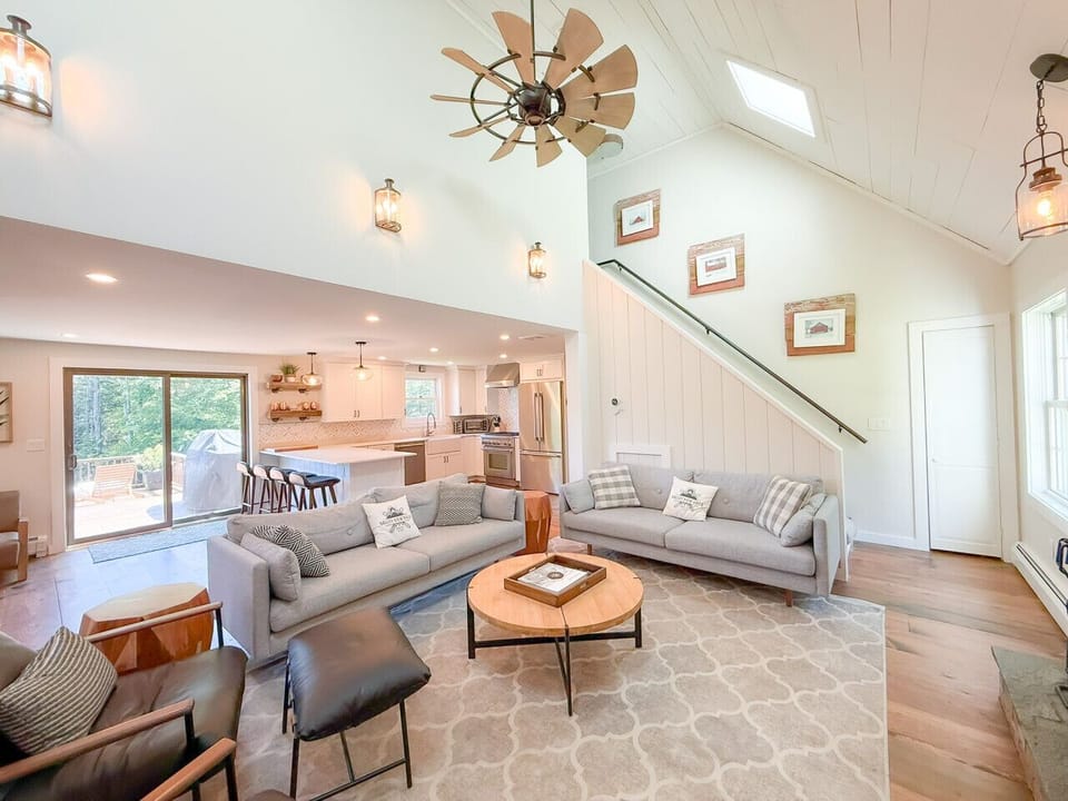 Living Room with Wood burning fireplace- 60` Smart TV