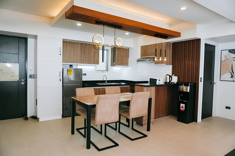 Premier Condo | Private kitchen | Full-size fridge, microwave, stovetop, cookware/dishes/utensils