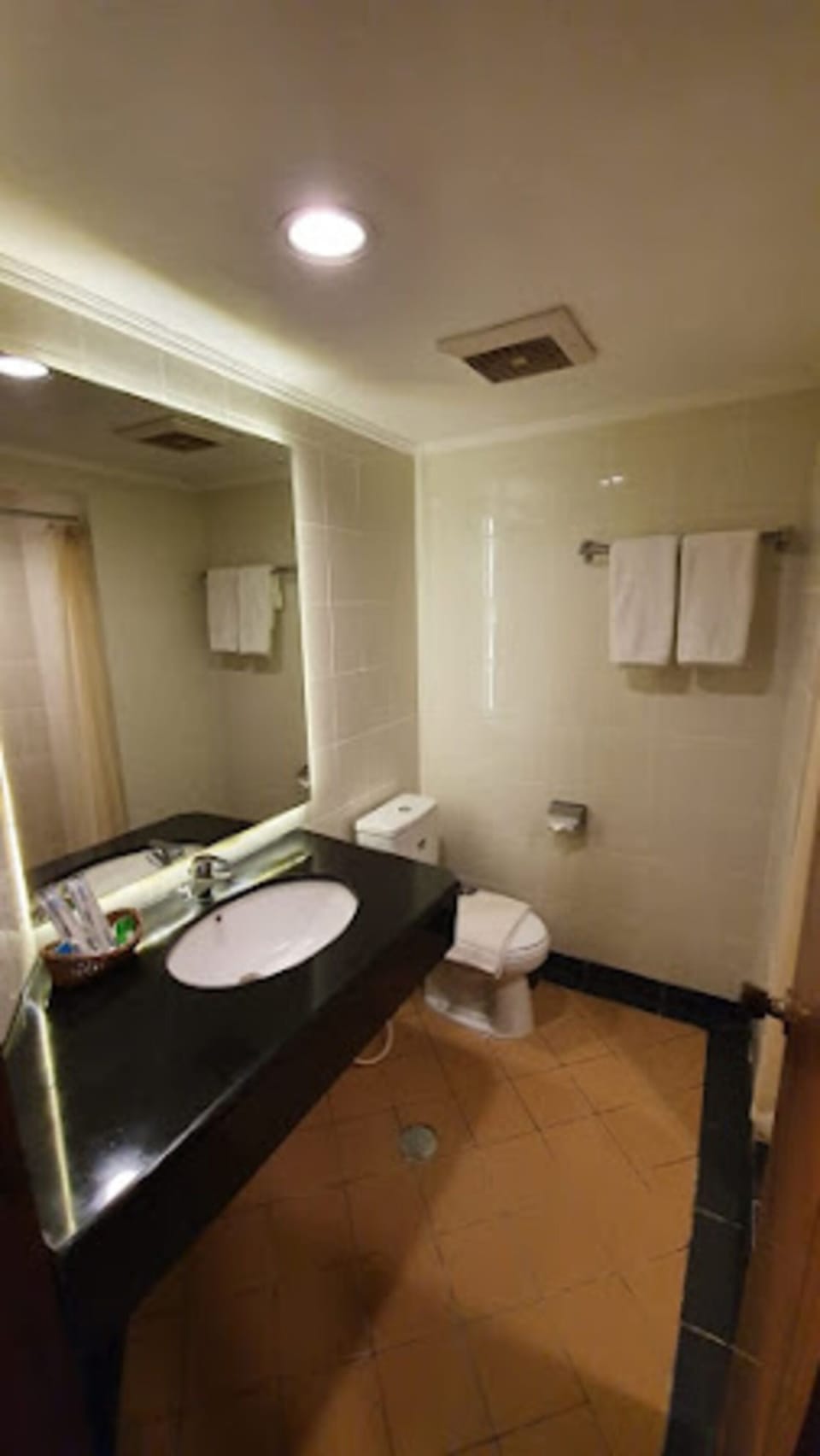 Shower, slippers, towels, soap
