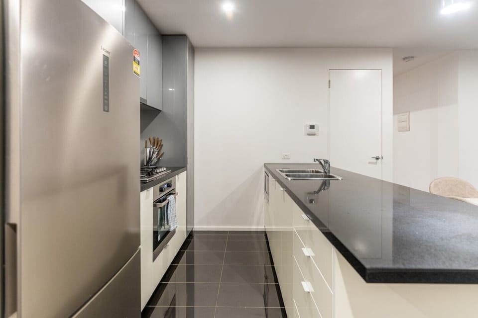 Apartment, 3 Bedrooms | Private kitchen | Full-size fridge, microwave, oven, stovetop