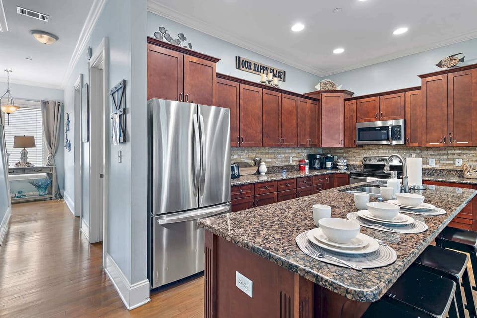 Fully-equipped kitchen perfect for whipping up meals and gathering around the island.