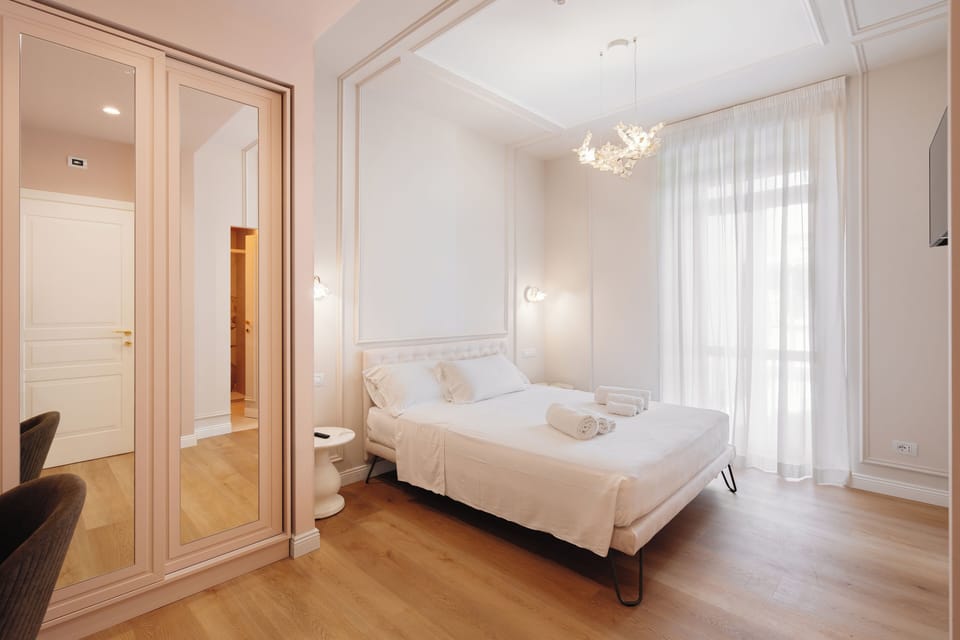 Premium bedding, down comforters, memory foam beds, minibar