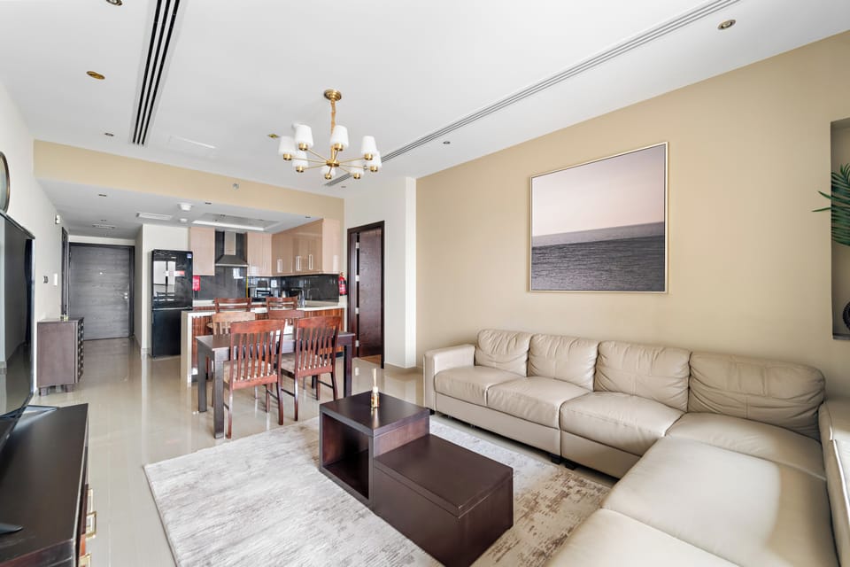 Deluxe Apartment, Canal View | Living area | Flat-screen TV