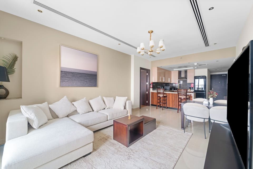 Deluxe Apartment, Canal View | Living area | Flat-screen TV