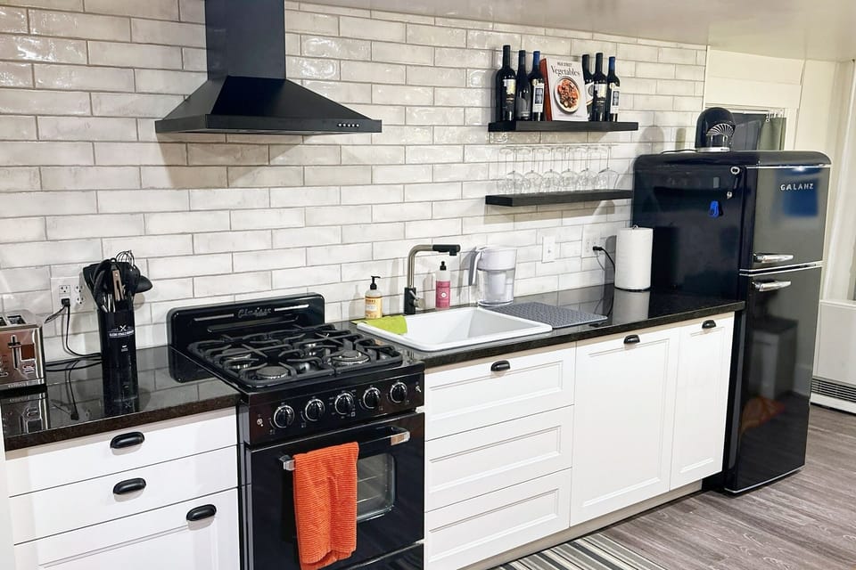 Full kitchen with top of the line appliances.
