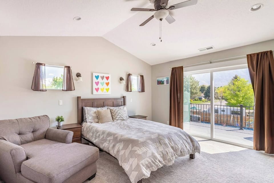 Master bed with deck overlooking yard 