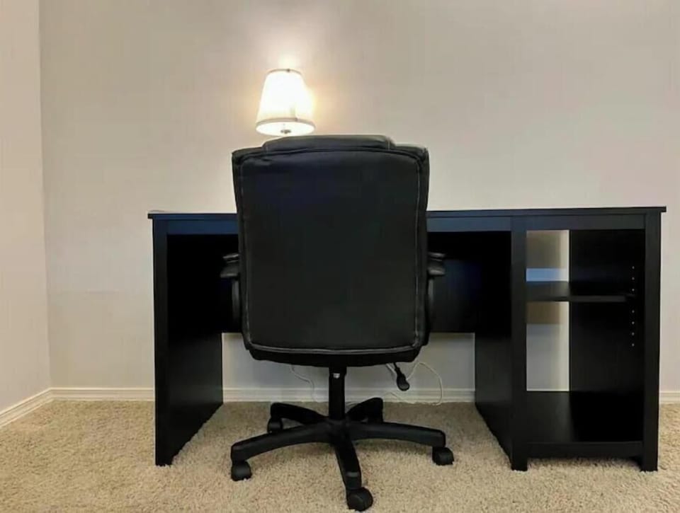 Dedicated work space in basement living area.