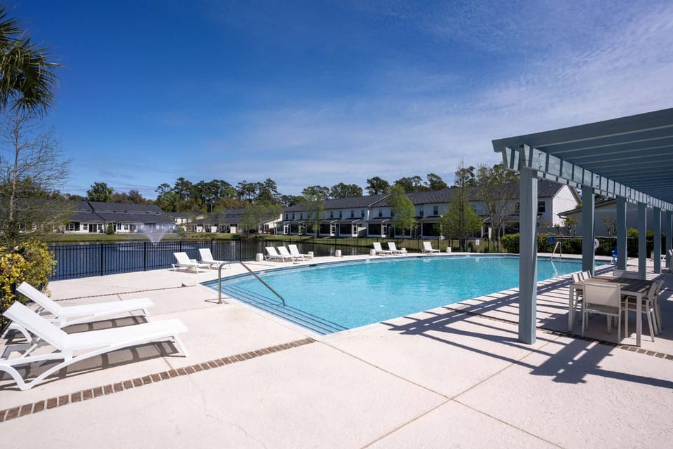Look out over the peaceful pond while laying in the sun or cooling off in the pool.