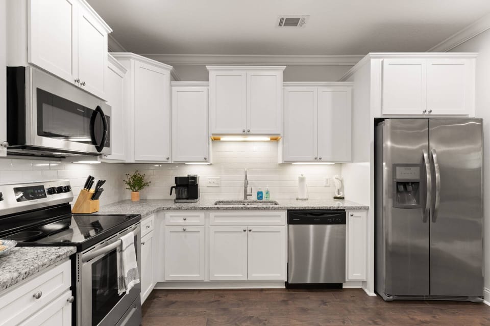 You'll find everything you need in this full stocked elegant kitchen.