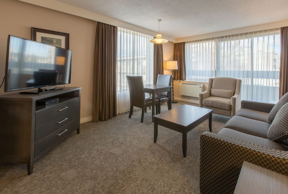 Signature Suite, 1 Queen Bed with Sofa bed | In-room safe, desk, blackout drapes, iron/ironing board