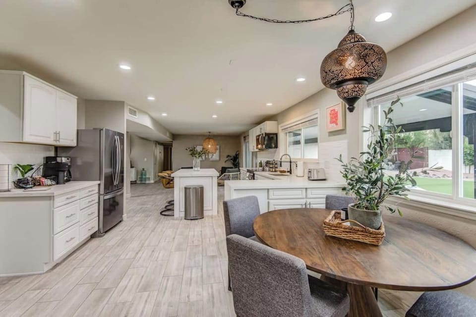 The eat-in kitchen offers a table for 4. Guests can also enjoy our coffee bar with Nespresso machine and Cuisinart drip coffee maker. We start off guests with Nespresso pods, ground coffee, tea, creamer and sugar.