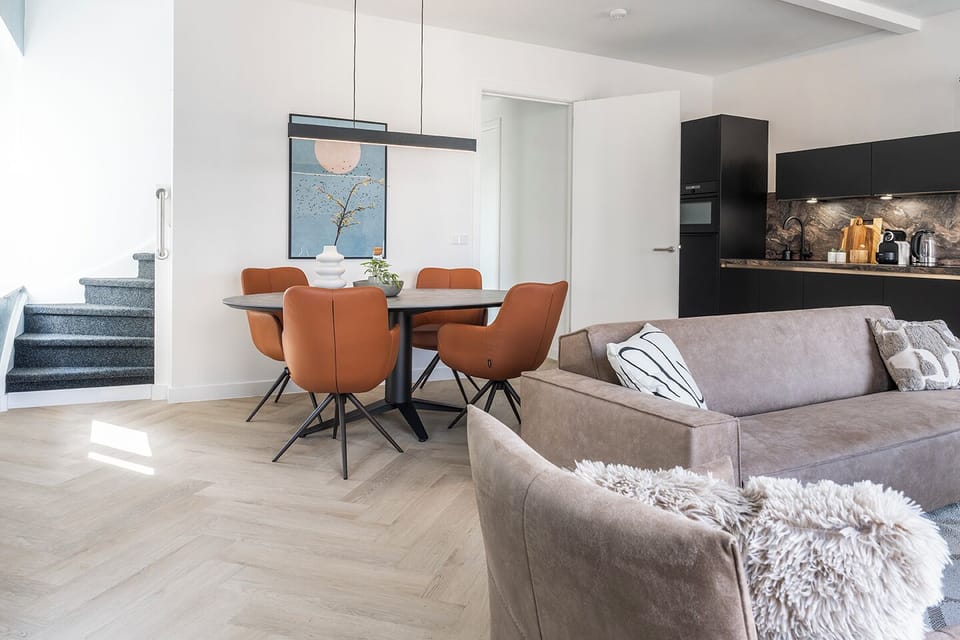 Make yourself at home in our comfy living room – the perfect spot for morning coffee or evening relaxation.