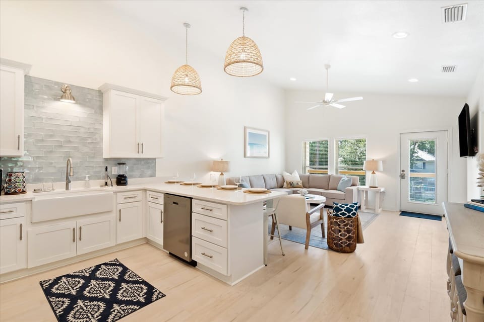 Spacious open-concept design seamlessly connecting the kitchen and living room!